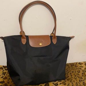 Used black longchamp bag